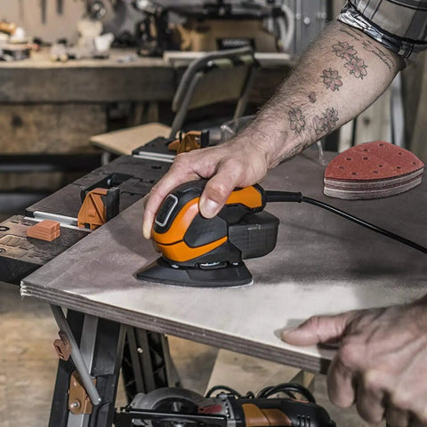 Man using mouse sander with 120 Piece Sanding Sheets For Mouse Sander With 11 Hole Dust Removal Mixed Grits 40 60 80 120 180 240