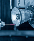 Close-up of machinery using a 50 Pcs Chainsaw Sharpener Bits With Box Set For Chain Saw Maintenance, Grinding Burr Stones And File Polishing Tool.