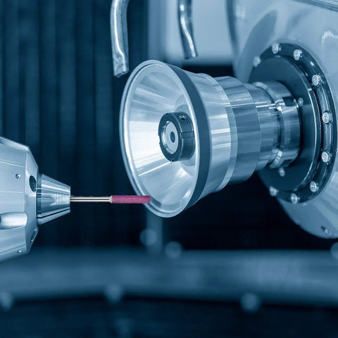 Close-up of machinery using a 50 Pcs Chainsaw Sharpener Bits With Box Set For Chain Saw Maintenance, Grinding Burr Stones And File Polishing Tool.