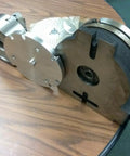 8 Inch Precision Horizontal Vertical Rotary Table With 6 Inch Three Jaw Chuck showing detailed gears and clamping components on a wooden table.