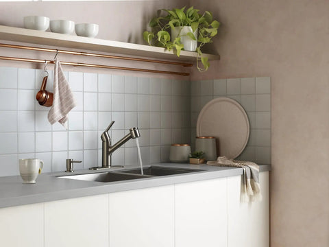 Spot Resist Stainless Single Handle Pull Out Sprayer Kitchen Faucet With Soap Dispenser and Power Clean in a modern kitchen setup