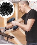 Man using a drill to assemble furniture with Bulletproof Heavy Duty Lock Screws And Nuts For Furniture Assembly, Black Cross Dowel Bolts.