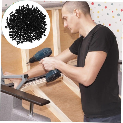 Man using a drill to assemble furniture with Bulletproof Heavy Duty Lock Screws And Nuts For Furniture Assembly, Black Cross Dowel Bolts.