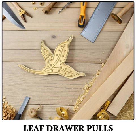 Brass Leaf Drawer Pulls For Cabinets And Wardrobes, Vintage Kitchen Cupboard Hardware, leaf-shaped design on wooden surface