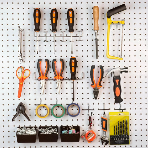 INCLY 120pcs pegboard accessories organizer kit on white pegboard with orange-handled tools, hooks and bins