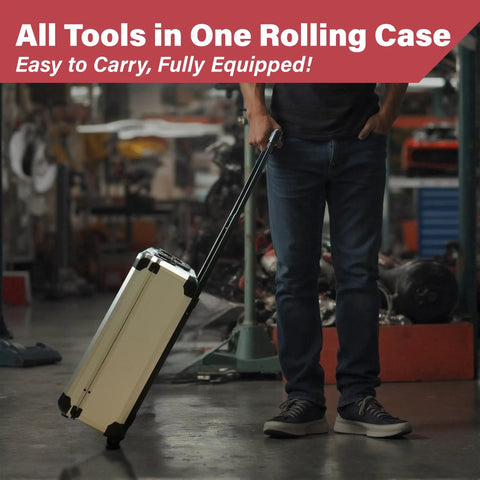 Person pulling the All In One 515 Piece Aluminum Trolley Tool Set on wheels in a garage setting.
