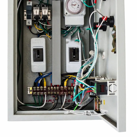 Close-up of electrical panel interior with wiring, switches, and a timer, no visible connection to Silver Nickel Plated Iron Miniature Door Hinge.