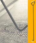 Two Piece 80 Centimeters Manhole Hook Lifter Set Heavy Duty Lifting Hooks For Manhole Covers And Storm Drains, shown lifting cover