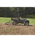 UTV with 60 inch Landscape Rake Attachment for ATV or UTV, 17 tines leveling a large yard, durable build for smooth ground prep