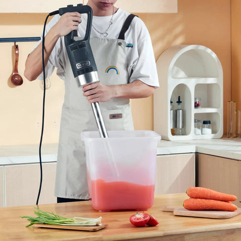 Person using Beast 750W Commercial Immersion Blender With 20 Inch Shaft Copper Motor Variable Speed 304 Stainless Steel Blade in kitchen.