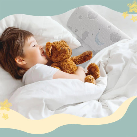 Child hugging teddy bear with Cozy Foam Bed Rail Bumpers For Toddlers With Semi Teardrop Design visible on bed