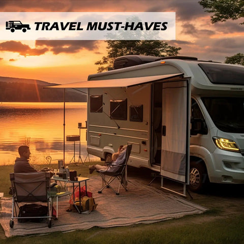RV parked by a lake with awning, chairs, and camping setup during sunset, labeled 'Travel Must-Haves'.
