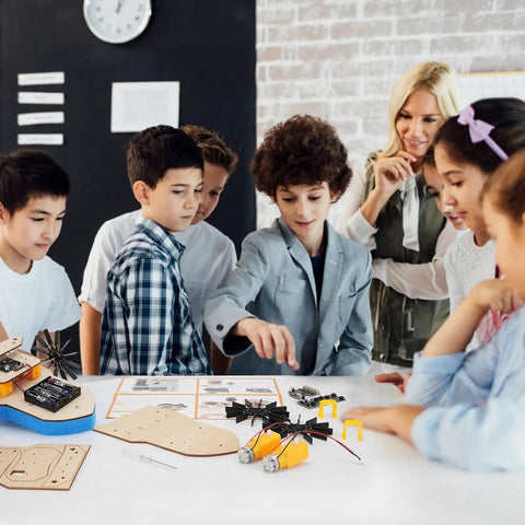 Children assembling Remote Control Boat Building Kit For Kids Ages 8-12, Guide reviews STEM Science Project pieces.