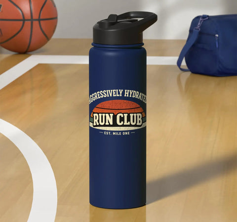 Aggressively Hydrated Run Club Stainless Steel Insulated Water Bottle With Retro Rainbow Graphic shown on basketball court with bag