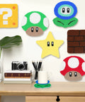Punch Needle Coaster Kit For Easy DIY Embroidery 6 Piece All In One Set With Fun Patterns Tools Yarns Hoop Instructions And Coaster Holder For Beginners Kids And Adults featuring colorful video game themed coasters on a desk setting.