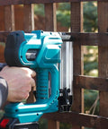 Heavy Hitter Cordless 2 In 1 Brad Nailer And Staple Gun with 2000mAh battery used on wooden fence