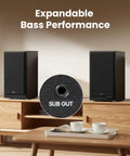 Powerful 144W 3-Way Powered Bookshelf Speakers With Sub Out For Desktop Studio Use on wooden shelf, sub out detail