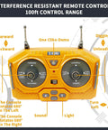 Front view of ID Gerilla RC excavator remote control, yellow with dual joysticks and antenna.
