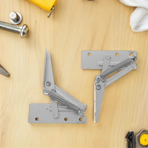 Heavy Duty 90 Degree Folding Scissor Spring Hinge for Cabinet Doors and Sofas in Steel Construction on wooden surface