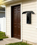 All Weather Stainless Steel Doorbell Rain Cover That Bosses Up Outdoor Protection With Anti Glare Sun Shade Installed on House