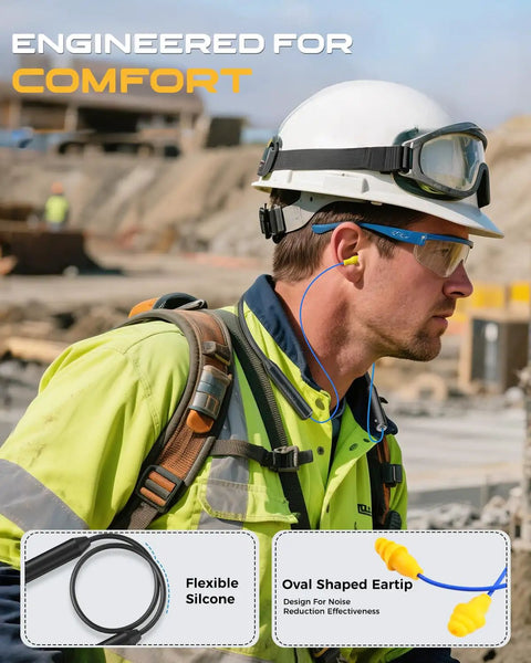 Construction worker wearing neckband wireless earbuds with 29 dB noise reduction, outfitted in safety gear on a job site.