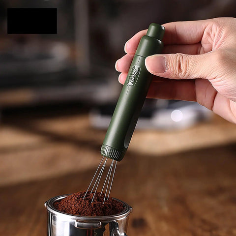 Dope Pink Magnetic Telescopic Coffee Distribution Needle And Rock Solid Stainless Steel Espresso Grounds Leveler in use, distributing coffee grounds.
