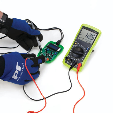 Automotive Digital Multimeter With Extra Large LCD Display And UL Listed Probes in use for bench electrical testing