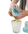 Person squeezing 3D Upgraded Silicone Ice Cube Tray With Easy Release For Fast Ice 30 Cubes, Leak Proof And Space Saving Freezer Organizer, BPA Free.