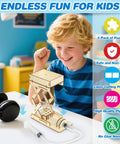 Five In One STEM Kit For Kids Ages 8 To 12 Build Sun Earth Moon Model Mini Telegraph Hand Generator Hydraulic Lift And Tension Structure Hands On Science Toy Gift For Boys And Girls, child playing with wooden hydraulic lift model.