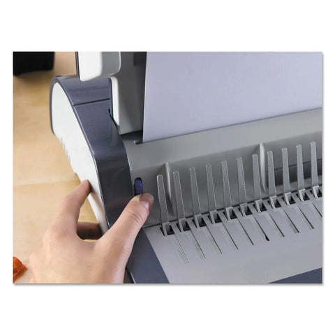Dead Simple Desktop Comb Binding Machine That Crushes 25 Sheets Fast And Locks Up To 500 Pages in use with paper guide.