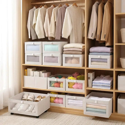 4 Pcs Foldable Closet Storage Bins With Clear Window For Slick Organization And No Sweat Folding To Keep Your Wardrobe Tidy And Make Room Organization A Total Breeze, displayed in a tidy closet with clothes.