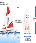 Voyager 280 Wind Powered RC Sailboat in Red with 17.5-inch height, shown on water with measurements and weight details.