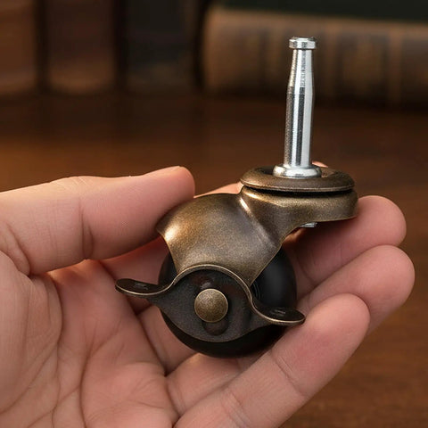 Heavy Duty 1.5 Inch Ball Casters With Secure Lock Brake Furniture Movers Set Of 4 Smooth Polyurethane Rollers in hand.