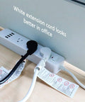 Flat Plug Extension Cord 1 Ft Beefy Heavy Duty 14 AWG 15A 125V 1875W White For Home Appliances shown plugged into power strip