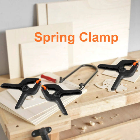 3 Inch Plastic Spring Clamps With Killer Anti Slip Grip Heavy Duty Woodworking And Backdrop Clips Hella Handy For Crafts Home Diy Total Flexible Tool Built Tough For Quick Projects on workbench with wooden panels
