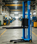 Heavy Duty Electric Portable Forklift Pallet Jack That Slides Heavy Loads Smoothly in a factory setting.
