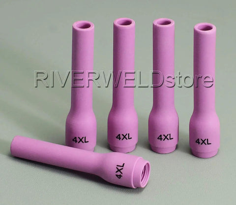 Top Tier Long Style TIG Ceramic Gas Nozzles Hella Durable Alumina Shanks Ten Piece Pack Runs Smooth On Standard Welding Torches Quarter Inch Throat Six Point Five Millimeter Bore Heavy Duty Shop Gear, set of four pink alumina nozzles.