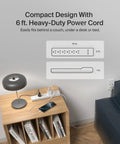 6 Outlet Surge Protector Power Strip Featuring A 360 Degree Rotating Plug And 6 Foot Cord on a wooden side table.