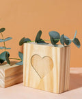 Heavy Duty Acrylic Heart Router Template For Practical Woodworking And Charcuterie Boards Features Twelve Cut Sizes Providing Flawless Trimming Lines That Make Custom Inlay Work No Sweat And Straight Fire, with heart cutout and eucalyptus.