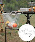 Sturdy Stainless Iron Trash Bag Holder Rack For Hanging Use Desktop Or Campin Dustbin Cage Garbage Bag Holder Bracket Durable Outdoor Cleanup Accessory Perfect For Campin Outdoor Events And Quick Cleanup Anywhere on table with cooking utensils