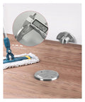Solid Green Bronze Magnetic Door Stopper Wall Or Floor Mounted Catch For Homes Offices, shown with measuring tool and mop.