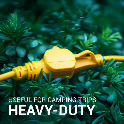 Yellow heavy-duty extension cord on grass, ideal for outdoor use, 50 Ft Heavy Duty Outdoor Indoor Extension Cord With 11 Outlets
