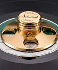 Nobsound STB-01 gold metal LP vinyl record stabilizer weight installed on record