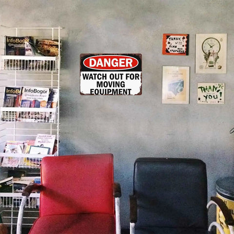 Aluminum Watch Out For Moving Equipment Warning Sign 8x12 Inch on office wall above chairs