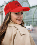 Red Washed Distressed Trucker Hat For Women Men Teens Lightweight Breathable Low Profile Baseball Cap Cute Lid That Goes With Dressy Or Casual Outfits One Size Fits Most Everyday Accessory worn by person outdoors