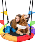 Girl and dog on Cool Kids Saucer Tree Swing For Backyard Fun Waterproof 900D Oxford Platform Round Flying Saucer with flags