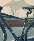 Side view of an electric bike with Suspension Seatpost For E Bikes And Heavy Riders Upgraded SP19 Shock Absorbing Comfort Post