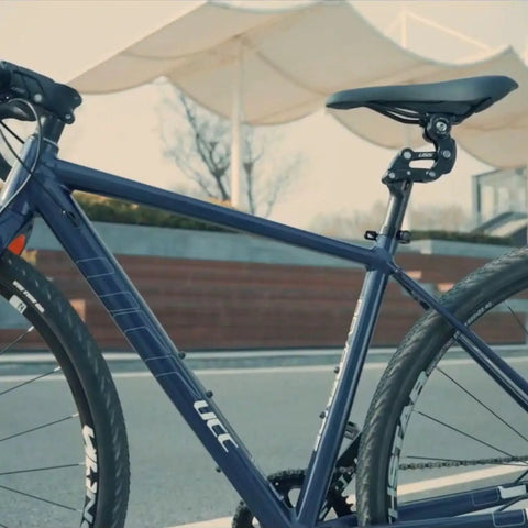 Side view of bicycle with Suspension Seatpost For E Bikes And Heavy Riders Upgraded SP19 visible, featuring shock absorption.