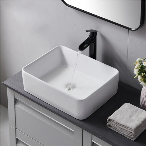 Rectangular White Ceramic Vessel Sink For Bathrooms 16 By 12 Inches Sleek Modern Farmhouse Above Counter Basin filled with running water