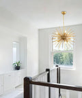 Golden Sputnik Chandelier Nine Lights Modern Starburst Fixture hanging in hallway room, solid metal design mid-century style.
